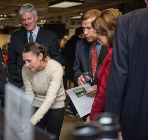 Showing 7 Generation Games to Mark Walsh, Head of the Office of Investment and Innovation at Small Business Administration; Mr. Ray Sweet; and Small Business Administrator Maria Contreras-Sweet. (Photo Credit: Emily Clack.)