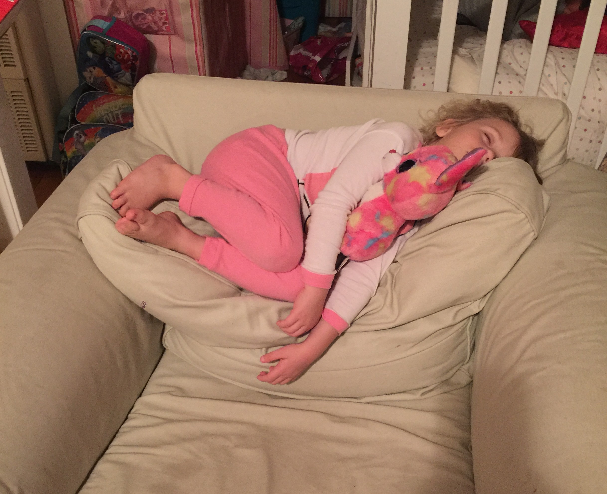 The same 4-year-old who didn't want to get up refused to get in her bed last night as she "wasn't sleepy" --- as shown by this picture taken 10 minutes after that statement. 