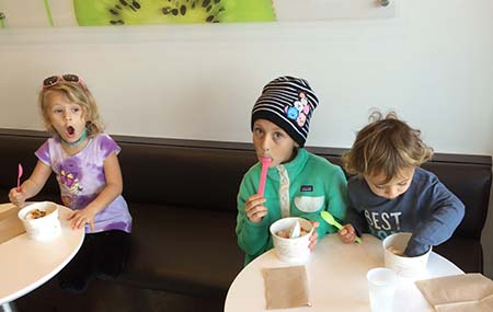 Kids enjoying yougurt