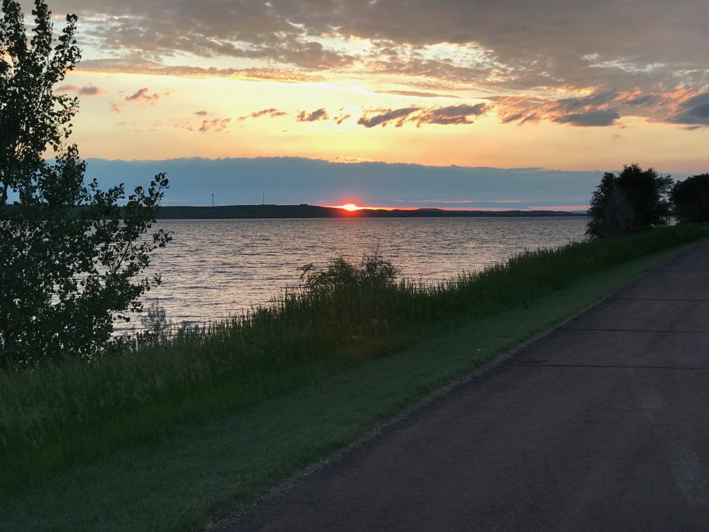 Sun sets over the river in Mobridge, SD where we are currently testing educational software